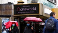File photo: People walk past a Cineworld in Leicester's Square, amid the coronavirus disease (COVID-19) outbreak in London, Britain, October 4, 2020. Reuters/Henry Nicholls/File Photo