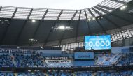 Soccer Football - Premier League - Manchester City v Everton - Etihad Stadium, Manchester, Britain - May 23, 2021 General view as the big screen displays the attendance, as a limited number of fans are permitted at outdoor sports venues Pool via REUTERS/D