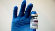 FILE PHOTO: A medical worker holds a bottle of AstraZeneca's COVID-19 vaccine at a vaccination centre  REUTERS/Lim Huey Teng/File Photo
