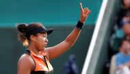 Japan's Naomi Osaka gestures. REUTERS/Kim Kyung-Hoon
