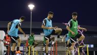 Qatar players attend a training session as they prepare for remaining Group E matches of Joint Asian Qualifiers for the 2023 AFC Asian Cup and the 2022 FIFA World Cup.
