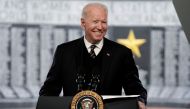 US President Joe Biden smiles as he attends an annual Memorial Day Service at Veterans Memorial Park, Delaware Memorial Bridge, New Castle, Delaware, U.S., May 30, 2021. (Reuters/Ken Cedeno)