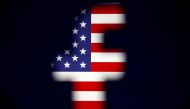 FILE PHOTO: A 3D-printed Facebook logo is displayed in front of a U.S. flag in this illustration taken, March 18, 2018. REUTERS/Dado Ruvic/Illustration/File Photo
