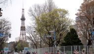 FILE PHOTO: Athletes compete at the half-marathon race which doubles as a test event for the 2020 Tokyo Olympics, in Sapporo, Japan May 5, 2021. Charly Triballeau/Pool via REUTERS/File Photo
