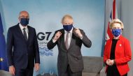 Britain's Prime Minister Boris Johnson meets with European Commission President Ursula von der Leyen and European Council President Charles Michel during the G7 summit in Carbis Bay, Cornwall, Britain, June 12, 2021. REUTERS/Peter Nicholls/Pool