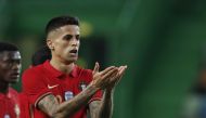 Portugal's Joao Cancelo celebrates scoring their third goal REUTERS/Pedro Nunes