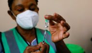 FILE PHOTO: healthcare worker prepares a dose of the Oxford/AstraZeneca coronavirus disease (COVID-19) vaccine at the National hospital /FILEPHOTO
