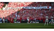 Soccer Football - Euro 2020 - Group B - Denmark v Belgium - Parken Stadium, Copenhagen, Denmark - June 17, 2021 Players and fans react after kicking the ball out in the 10th minute of the match to applaud Denmark's Christian Eriksen who remains in hospita