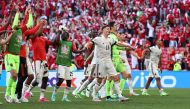Soccer Football - Euro 2020 - Group B - Denmark v Belgium - Parken Stadium, Copenhagen, Denmark - June 17, 2021 Belgium players celebrate after the match Pool via REUTERS/Wolfgang Rattay
