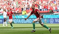 Hungary's Attila Fiola celebrates scoring their first goal. (REUTERS/Tibor Illyes)