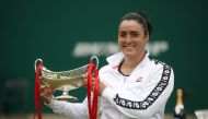 Tunisia's Ons Jabeur celebrates with the trophy after winning her final match against Russia's Daria Kasatkina Action Images via Reuters/Matthew Childs