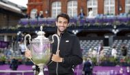 Tennis - ATP 500 - Queen's Club Championships - Queen's Club, London, Britain - June 20, 2021 Italy's Matteo Berrettini poses as he celebrates winning the final match against Britain's Cameron Norrie with the trophy Action Images via Reuters/Paul Childs
