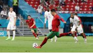 Soccer Football - Euro 2020 - Group F - Portugal v France - Puskas Arena, Budapest, Hungary - June 23, 2021 Portugal's Cristiano Ronaldo scores their second goal from the penalty spot Pool via REUTERS/Bernadett Szabo
