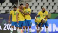Brazil's Casemiro celebrates scoring their second goal with Danilo REUTERS/Sergio Moraes