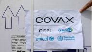 Workers offload the AstraZeneca/Oxford vaccines under the COVAX scheme against coronavirus disease (COVID-19) at the Aden Abdulle Osman Airport in Mogadishu, Somalia March 15, 2021. REUTERS/Feisal Omar/File Photo
