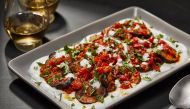 Afghan-Style Grilled Eggplant With Tomato Sauce, Yogurt and Herbs. (Photo by Tom McCorkle for The Washington Post)