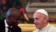 FILE PHOTO: Pope Francis talks with Haiti's President Jovenel Moise during a Private Audience at the Vatican January 26, 2018. REUTERS/Alberto Pizzoli/Pool