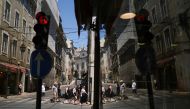 People wearing protective masks walk in Lisbon downtown amid the coronavirus disease (COVID-19) pandemic, in Lisbon, Portugal, July 8, 2021. REUTERS/Pedro Nunes
