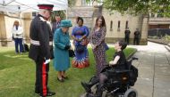 Britain's Queen Elizabeth meets guests during a visit to Manchester Cathedral, in Manchester, Britain, July 8, 2021. (Reuters)