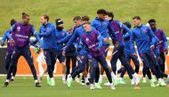 Soccer Football - Euro 2020 - England Training - St. George's Park, Burton Upon Trent, Britain - July 6, 2021 England's Kieran Trippier with teammates during training REUTERS/Lee Smith
