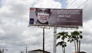 A billboard mounted at the Airport Road to campaign against the spread of the COVID-19 coronavirus is seen in Ikeja in Lagos, on April 20, 2020. / AFP / PIUS UTOMI EKPEI
