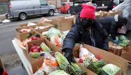 Food boxes are packed at the nonprofit New Life Centers' food pantry in Chicago, Illinois, U.S. March 16, 2021. REUTERS/Daniel Acker/File Photo

