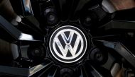 The logo of German carmaker Volkswagen is seen on a rim cap in a showroom of a Volkswagen car dealer in Brussels, Belgium July 9, 2020. REUTERS/Francois Lenoir/File Photo