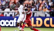  Qatar defender Abdelkarim Hassan (3) and Panama midfielder Edgar Barcenas (10) battle for the ball during the CONCACAF Gold Cup Soccer group stage play at BBVA Stadium. Mandatory Credit: Maria Lysaker