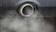 An exhaust emits fumes as a car is driven through Richmond in London, Britain December 2, 2016. REUTERS/Peter Nicholls/File Photo
