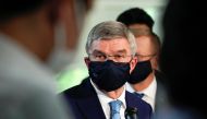 International Olympic Committee President Thomas Bach speaks to journalists after a meeting with Japanese Prime Minister Yoshihide Suga, in Tokyo, Japan, July 14, 2021. Kimimasa Mayama/Pool via REUTERS
