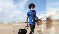 Qatar striker Akram Afif at the airport after reaching Phoenix from Houston. 