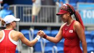 Naomi Osaka of Japan shakes hands with Viktorija Golubic of Switzerland after winning her second-round match Reuters/Mike Segar