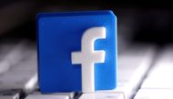 A 3D-printed Facebook logo is seen placed on a keyboard in this illustration taken March 25, 2020. REUTERS/Dado Ruvic/Illustration/File Photo/File Photo