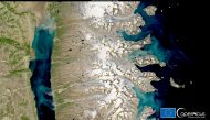 This image, acquired by one of the Copernicus Sentinel-2 satellites, shows the very significant discharge of sediment into the Arctic Ocean by glaciers melting around Constable Pynt as a result of unusually high temperatures, Greenland July 28, 2021. Euro