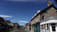 An empty street with closed shops is seen as the spread of the coronavirus disease (COVID-19) continues Pitlochry, Scotland, Britain April 15, 2020. REUTERS/Russell Cheyne


