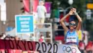 Tokyo 2020 Olympics - Athletics - Women's 20km Walk - Sapporo Odori Park, Sapporo, Japan - August 6, 2021. Antonella Palmisano of Italy celebrates crossing the finish line to win gold REUTERS/Feline Lim
