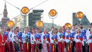 Athletes of the Russian Olympic Committee attend a welcoming ceremony after returning from the Tokyo 2020 Olympic Games on Red Square in Moscow, Russia August 9, 2021. REUTERS/Evgenia Novozhenina
