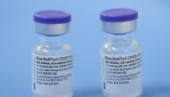 Vials of the Pfizer-BioNTech vaccine are pictured in a vaccination centre in Geneva, Switzerland, February 3, 2021. REUTERS/Denis Balibouse/File Photo