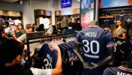 Fans buy Paris St Germain Messi football jerseys inside a Paris St Germain shop in Paris, France, August 11, 2021. REUTERS/Sarah Meyssonnier
