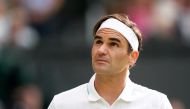 FILE PHOTO: Jul 7, 2021; London, United Kingdom; Roger Federer (SUI) plays against Hubert Hurkacz (POL) in the quarter finals at All England Lawn Tennis and Croquet Club. Mandatory Credit: Peter van den Berg-USA TODAY Sports/File Photo
