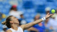 Simona Halep (ROU) serves the ball against Magda Linette (POL) during the Western and Southern Open tennis tournament at Lindner Family Tennis Center. Aaron Doster-USA TODAY Sports