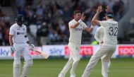 Cricket - Third Test - England v India - Headingley, Leeds, Britain - August 25, 2021 England's James Anderson celebrates taking the wicket of India's Virat Kohli with England's Craig Overton Action Images via Reuters/Lee Smith
