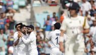India's Shardul Thakur celebrates taking the wicket of England's Rory Burns with India's Virat Kohli Action Images via Reuters/Andrew Couldridge