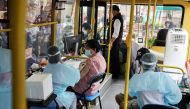 A woman receives a jab of the coronavirus disease (COVID-19) vaccine inside a mobile vaccination bus set-up to serve the elderly and disabled groups in Bangkok, Thailand, September 8, 2021. REUTERS/Juarawee Kittisilpa