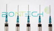 FILE PHOTO: Oliver Ortega, 13, receives the second dose of the Pfizer-BioNTech 