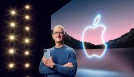 Apple CEO Tim Cook holds the iPhone 13 Pro Max and Apple Watch Series 7 during a special event at Apple Park in Cupertino, California broadcast September 14, 2021. Apple Inc/Handout via REUTERS 