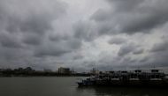 Clouds cover the skies over the river Ganges ahead of Cyclone Amphan, in Kolkata, India, May 19, 2020. REUTERS/Rupak De Chowdhuri/Files