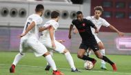 Al Rayyan captain Abdelaziz Hatim controls the ball during yesterday's match against Al Wakrah.