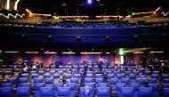People take their seats inside the Odeon Luxe Leicester Square cinema, on the opening day of the film 