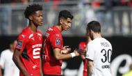 Paris Saint-Germain's Lionel Messi shakes hands with Stade Rennais' Nayef Aguerd after the match REUTERS/Stephane Mahe